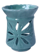 Photophore décoratif marocain en poterie de couleur vert émaillé cerclé et orné de ciselures Photophore décoratif marocain en poterie de couleur vert émaillé cerclé et orné de ciselures